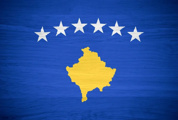 Bandera de Kosovo sobre textura de madera —  Fotos de Stock