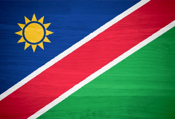 Flaga Namibii na tekstury drewna — Zdjęcie stockowe