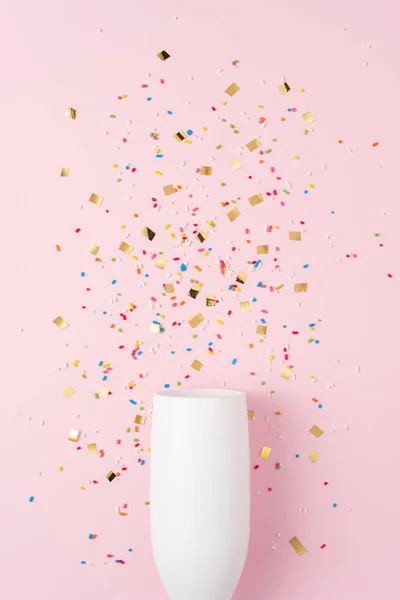 White Champagne Glass Confetti Pink Background Minimal Party Concept — Foto de Stock