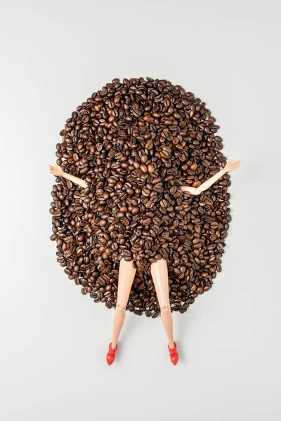 Legs Arms Girl Doll Stick Out Pile Coffee Beans Creative — Stock Photo, Image