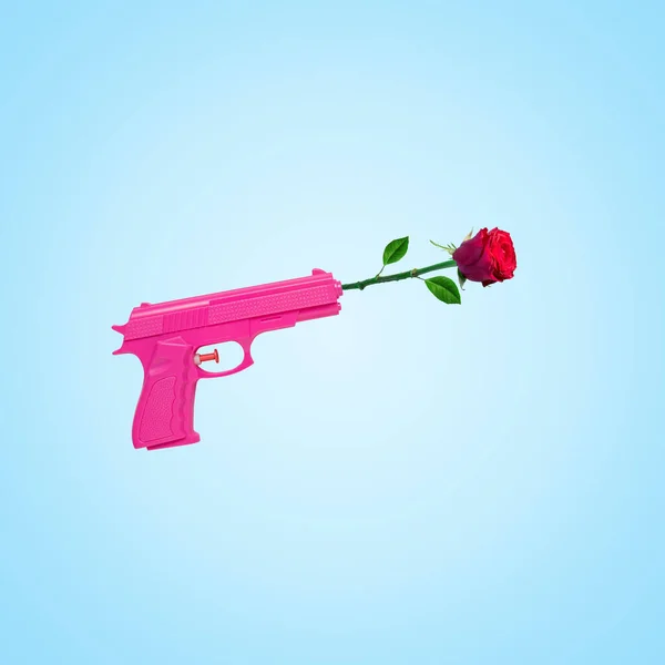 Rose Flower Pink Handgun Blue Background Minimal Holiday Concept — Stockfoto