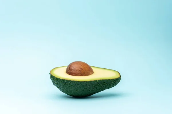 Tropical Summer Concept Made Avocado Fruit Pastel Blue Backdrop Creative — Zdjęcie stockowe