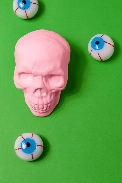 Creative Layout Pink Skull Eyeballs Green Background Minimal Halloween Concept — Φωτογραφία Αρχείου
