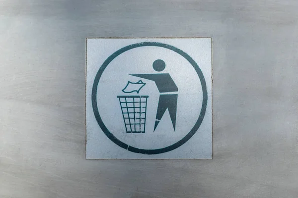 Garbage symbol, recycle bin icon, logo on metal background.