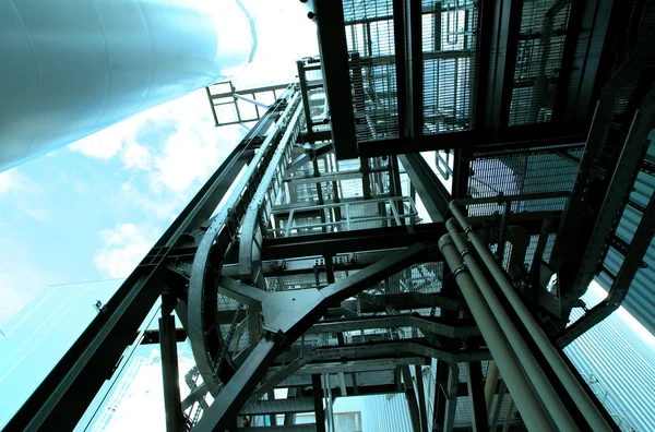 Industrial zone, Steel pipelines and cables in blue tones — Stock Photo, Image