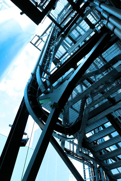 Industrial zone, Steel pipelines and cables in blue tones — Stock Photo, Image