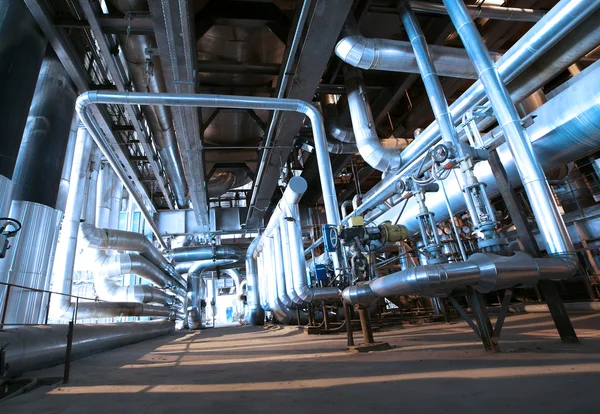 Industrial zone, Steel pipelines and cables in blue tones — Stock Photo, Image