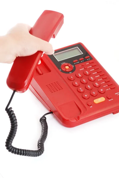 Красный наушник из винтажного телефона, изолированный на белом — стоковое фото