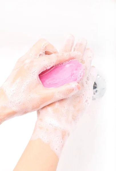 Hands covered with soap being washed in the sink — Stock Photo, Image