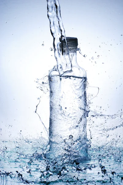 Water splash out of glass — Stock Photo, Image