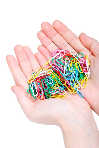 Hands full of paper clips — Stock Photo, Image