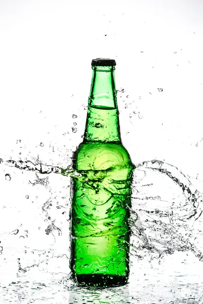 Beer bottle with water splash — Stock Photo, Image