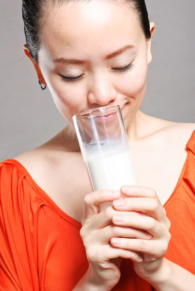 Young Woman with a glass of milk — Stock Photo, Image