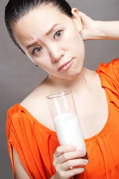 Young Woman with a glass of milk — Stock Photo, Image
