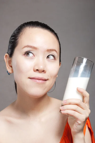 Young Woman with a glass of milk — Stock Photo, Image