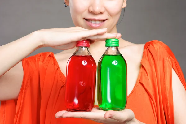 Portrait of woman with bottle of water — Stock Photo, Image