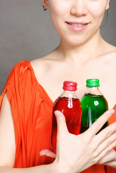 Portrait of woman with bottle of water — Stock Photo, Image