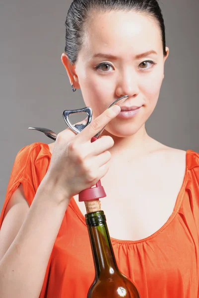 The girl in the open red wine — Stock Photo, Image