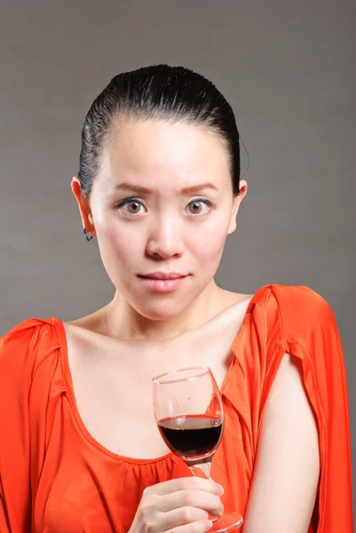 Beautiful woman with glass red wine — Stock Photo, Image