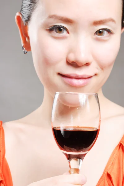 Beautiful woman with glass red wine — Stock Photo, Image