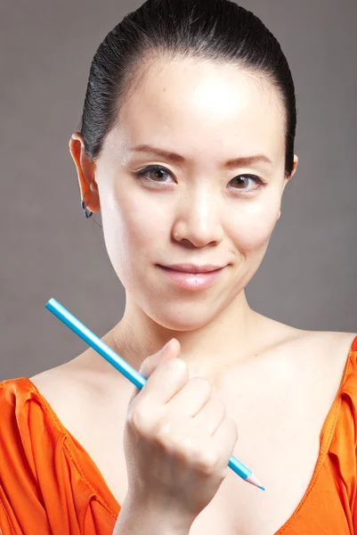 Business woman in a light beige suit — Stock Photo, Image