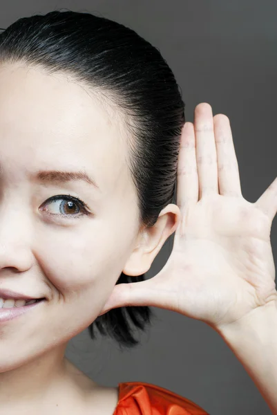 Young woman listening close up. — Stock Photo, Image