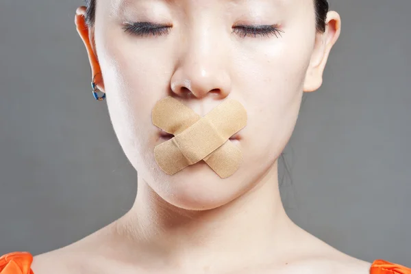 Young women stick the concept of the mouth — Stock Photo, Image