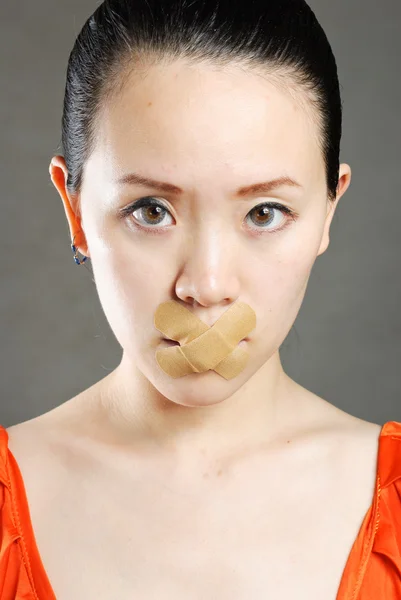 Young women stick the concept of the mouth — Stock Photo, Image