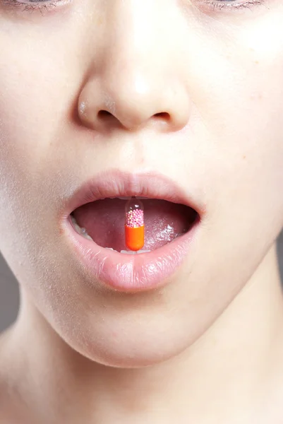 A female oral a medicine — Stock Photo, Image