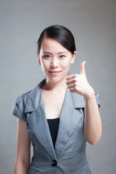 Portrait of a young beautiful woman with two thumbs up — Stock Photo, Image