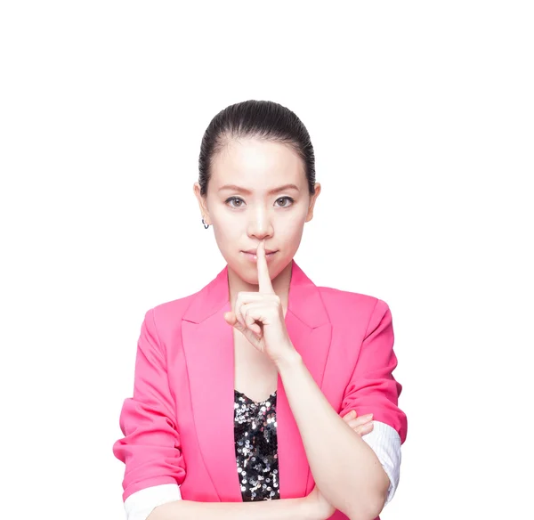 Young girl with her finger over her mouth isolated on white — Stock Photo, Image