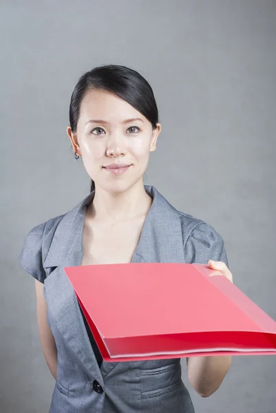 Bright picture of beautiful woman with folders — Stock Photo, Image