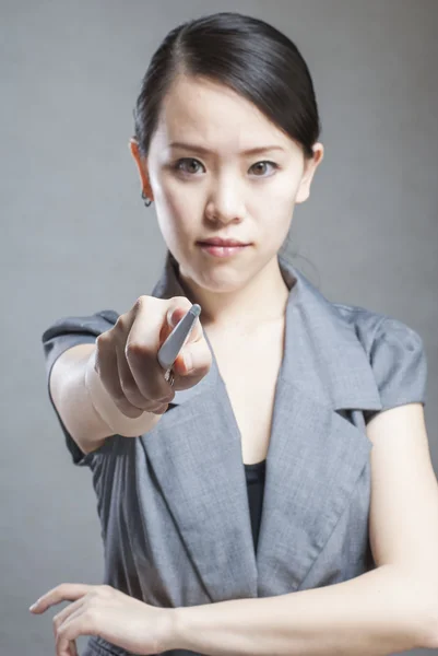 Business woman in a light beige suit — Stock Photo, Image