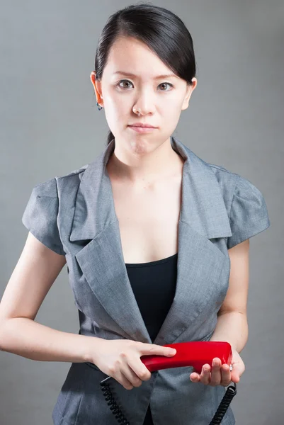 Attractive businesswoman using mobile phone — Stock Photo, Image