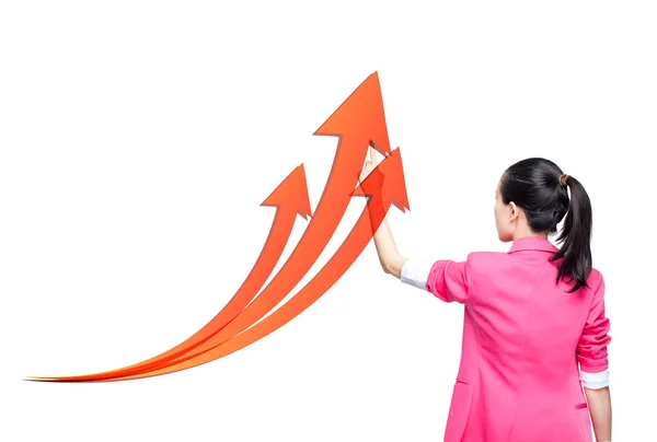 Business woman holding an rising arrow graph — Stock Photo, Image