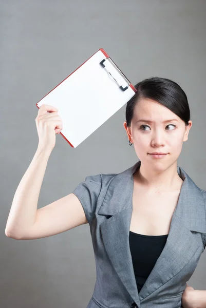 Beautiful business woman with a white banner. — Stock Photo, Image