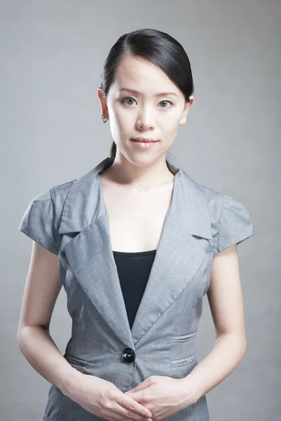 Young pretty business woman with notebook in the office — Stock Photo, Image