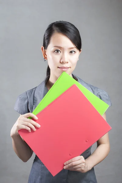 Bright picture of beautiful woman with folders — Stock Photo, Image