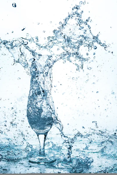 Water splash out of glass — Stock Photo, Image