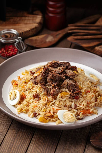 Uzbek national dish pilaf with rice and meat — Stock Photo, Image