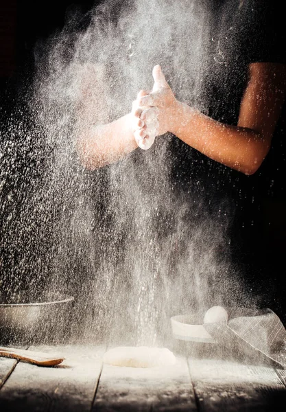 Baker hand with flour pizza preparation — Stock Photo, Image