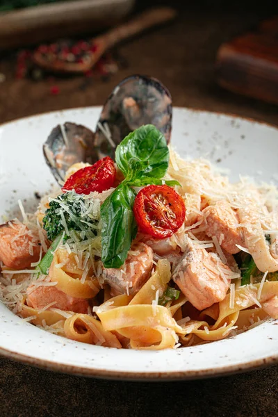 Closeup on salmon tagliatelle pasta — Stock Photo, Image