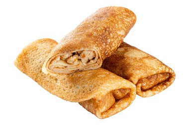 Isolated stuffed russian pancake rolls crepes on white background