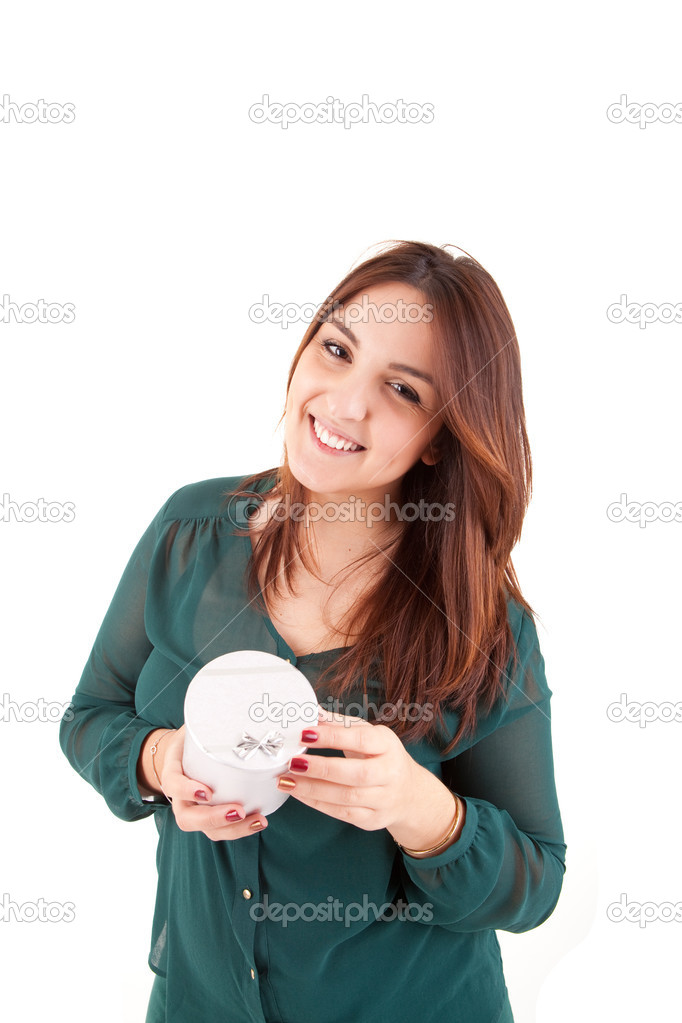 Beautiful woman holding presents while smiling