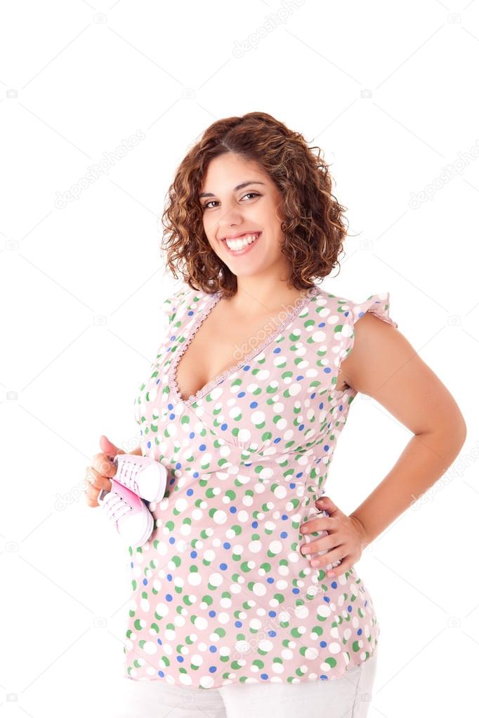 Beautiful pregnant woman showing her good shape