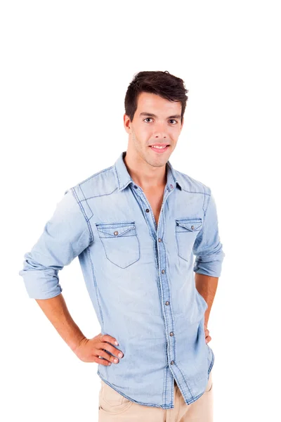 Retrato de joven guapo en ropa casual de pie sobre w — Foto de Stock