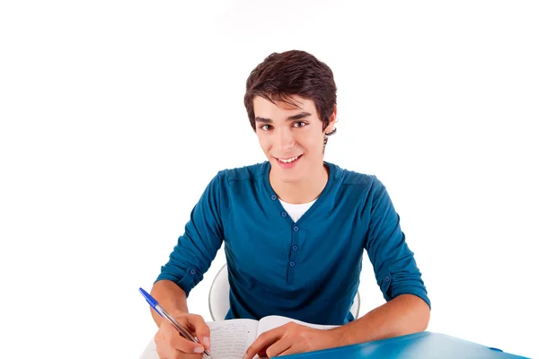 Jeune étudiant heureux portant des livres — Photo