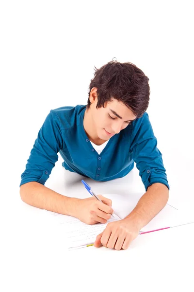 Jovem estudante feliz carregando livros — Fotografia de Stock