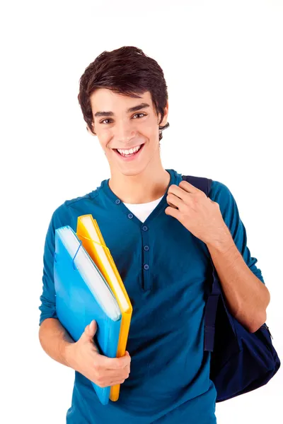 Νεαρός χαρούμενος μαθητής που κουβαλάει βιβλία — Φωτογραφία Αρχείου