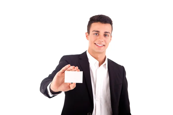 Joven hombre de negocios entregando una tarjeta de visita en blanco sobre la espalda blanca — Foto de Stock